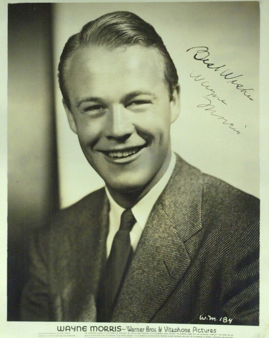 Actor WAYNE MORRIS - Photo Signed: Wayne Morris (1914-1959) Actor. Morris was a friendly, open-faced, "all-American" type of hero, usually cast as a not-too-bright nice guy. His popularity increased after he played the title role in Ki