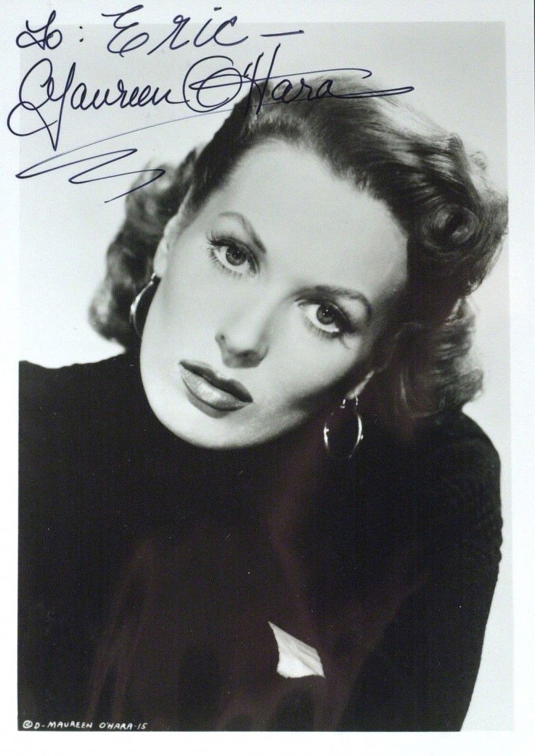 Irish Actress MAUREEN O'HARA - Photo Signed: Maureen O'Hara (1920- ) Irish actress. O'Hara has been noted for playing fiercely passionate heroines with a highly sensible attitude. She often worked with director John Ford and longtime friend John