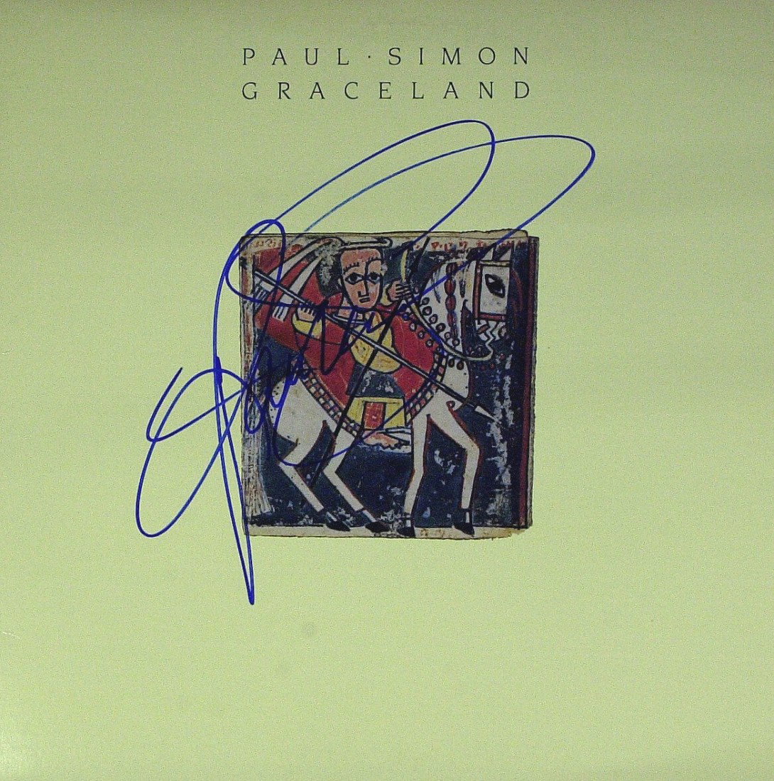 Singer, Songwriter PAUL SIMON - Record Album Signe: Paul Simon (1941- ) Singer, songwriter. Simon and Art Garfunkel made up one of the most successful musical acts of the 1960s. On the strength of Simon's songwriting and Garfunkel's harmonies they beca
