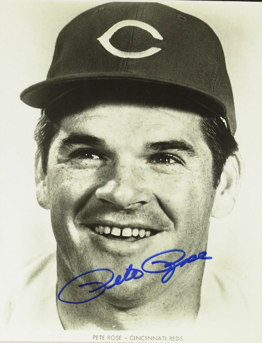 Charlie Hustle PETE ROSE - Two Photos Signed: Pete Rose. Two signed photographs: 10" x 8" color composite signed in silver ink and an 8" x 10" which is matted to 11" x 14".