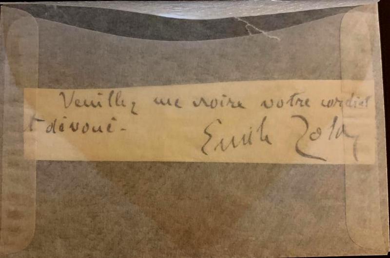 Zola,Emile Signed and Inscribed Cut Slip: Ã‰mile Ã‰douard Charles Antoine Zola (1840 â€“1902) was a French novelist, journalist, playwright, the best-known practitioner of the literary school of naturalism , and an important contri