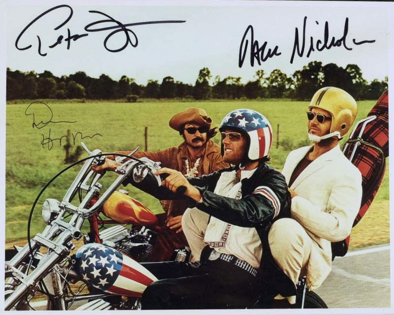 1969 Film EASY RIDER - Cast Signed Photo: Easy Rider. Easy Rider was a 1969 road movie starring Peter Fonda (1939- ), Dennis Hopper (1936-2010), and Jack Nicholson. It tells the story of two bikers (played by Fonda and Hopper) who travel thro