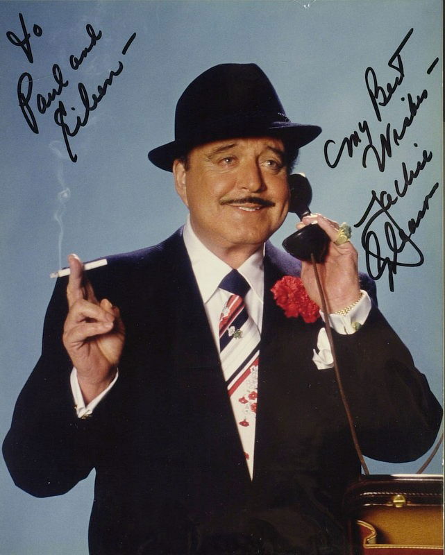 Ralph Cramden JACKIE GLEASON - Color Photo Signed: Jackie Gleason (1916-1987) Comedian, actor. Gleason was a big, bluff comedian of the 1950s and 1960s. One of television's early stars, he specialized in blustering loudmouths, blue-collar philosophers