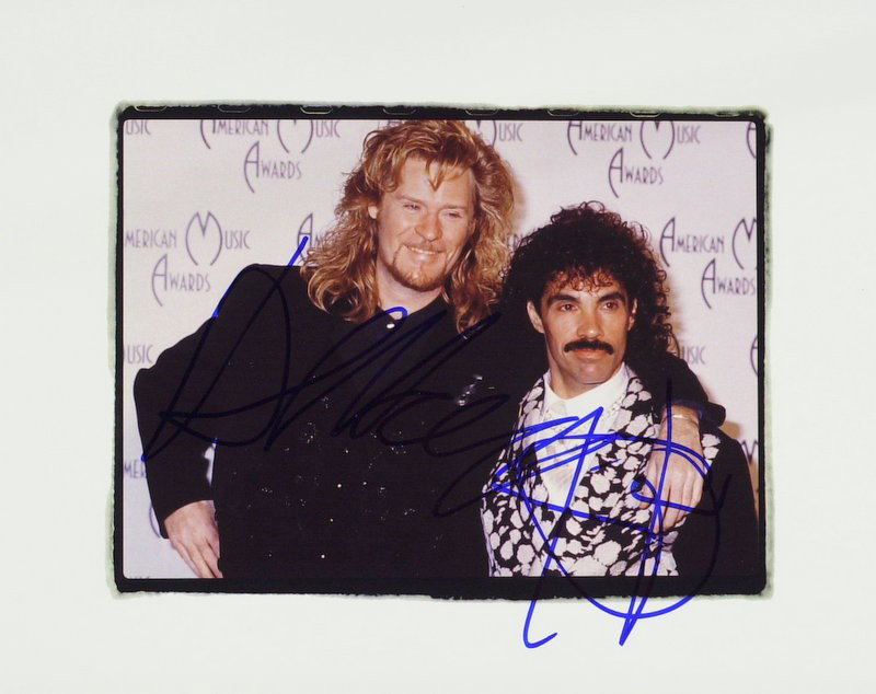 DARYL HALL & JOHN OATES - Photo Signed: Daryl Hall (1948- ) and John Oates (1949- ) Musicians. Hall and Oates achieved their greatest fame in the late 1970s and early to mid-1980s. Both sing and play instruments. They specialized in a fusio
