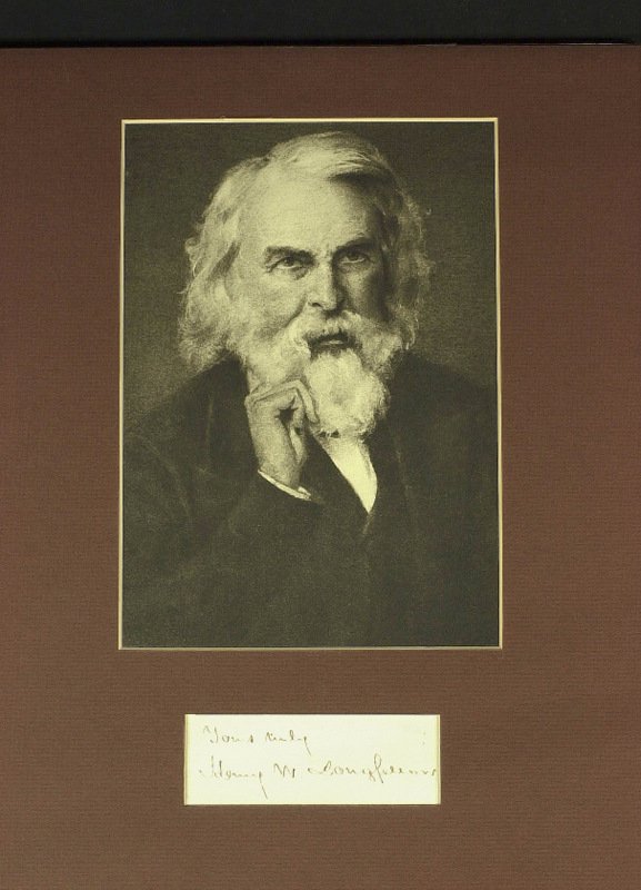HENRY WADSWORTH LONGFELLOW - Matted Card: Henry Wadsworth Longfellow. 4” x 1 ¼” (exposed) cut signature, “Yours truly, Henry W. Longfellow,” matted with a printed image to 11” x 14”. Slight ink skipping.