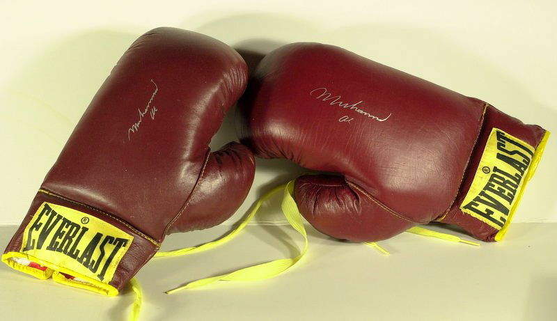 MUHAMMAD ALI - Pair of EVERLAST GLOVES Signed: Muhammad Ali (1942- ) Heavyweight champion. Ali was the dominant heavyweight fighter of the 1960s and 1970s. A fighter of exceptional speed, cunning and flair, Ali won the world heavyweight title on t