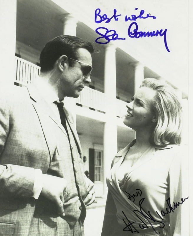 JAS BOND:Goldfinger-Photo CONNERY, BLACKMAN: James Bond: Goldfinger. 8” x 10” black and white photograph signed by Sean Connery “Best wishes Sean Connery” and Honor Blackman “and Honor Blackman.”