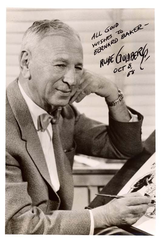 Goldberg, Rube American Cartoonist Signed Photo: Rube Goldberg (1883-1970) American cartoonist who received the Pulitzer Prize for his political cartooning in 1948. Goldberg is best known for his depictions of Rube Goldberg machines, complex devices
