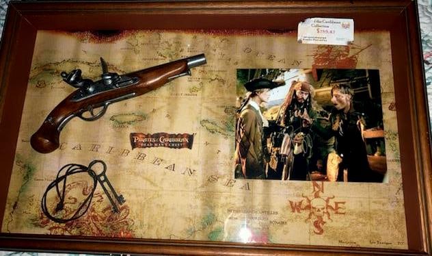 Pirates of the Caribbean Large Lot: Pirates of the Caribbean is an American fantasy supernatural swashbuckler film series produced by Jerry Bruckheimer and based on Walt Disney 's theme park attraction of the same name . Included in thi