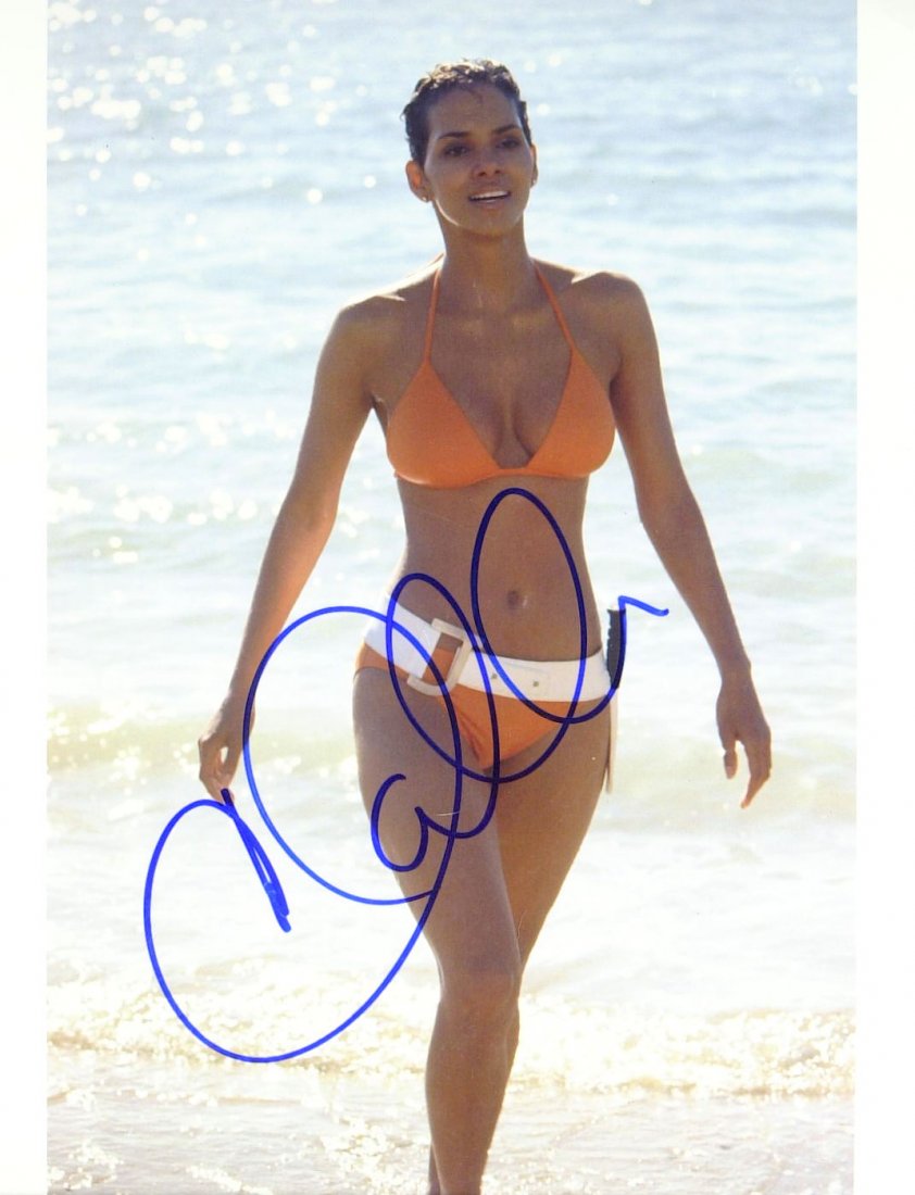 Bond Girl HALLE BERRY - Bond Photo Signed: James Bond: Halle Berry (1966- ) Actress. received an Emmy, Golden Globe, SAG, and an NAACP Image Award for Introducing Dorothy Dandridge[2] and won an Academy Award for Best Actress and was nominated