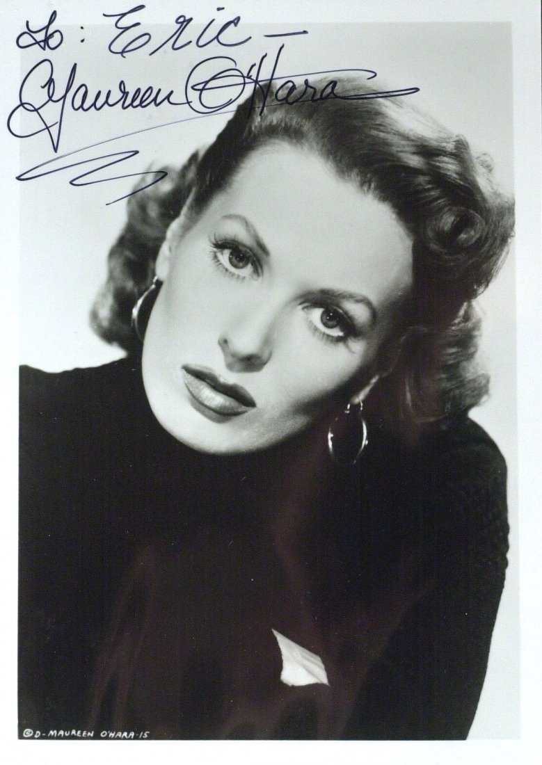 Wayne Co-Star MAUREEN O'HARA - Photo Signed: Maureen O’Hara. 5” x 7” black and white photograph signed, “To Eric Maureen O’Hara.”
