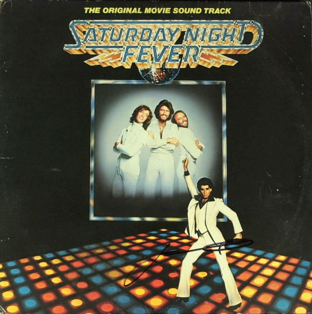 Grease Actor JOHN TRAVOLTA - Photo Signed: John Travolta (1954- ) Actor. Travolta first became known in the 1970s, after appearing on the television series Welcome Back, Kotter and starring in the box office successes Saturday Night Fever and