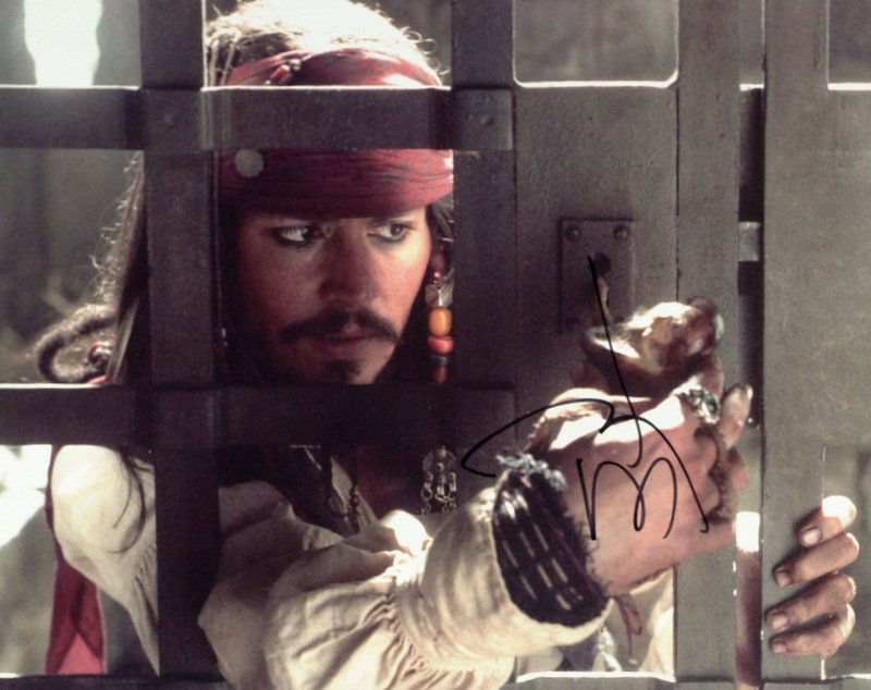 Actor JOHNNY DEPP - Oversized Photo Signed: Johnny Depp (1963- ) Actor. Depp rose to prominence on the 1980s television series 21 Jump Street, becoming a teen idol. Dissatisfied with that status, Depp turned to film for more challenging roles;