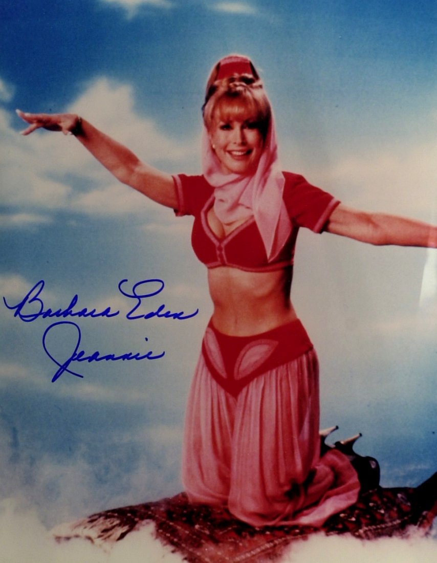 Jeannie Actress BARBARA EDEN - Large Photo Signed: Barbara Eden (1934- ) Actress. Eden is best known for starring as the title role in the situation comedy, I Dream of Jeannie, which aired from 1965 until 1970. 11”x 14” color photograph, as Jeanni