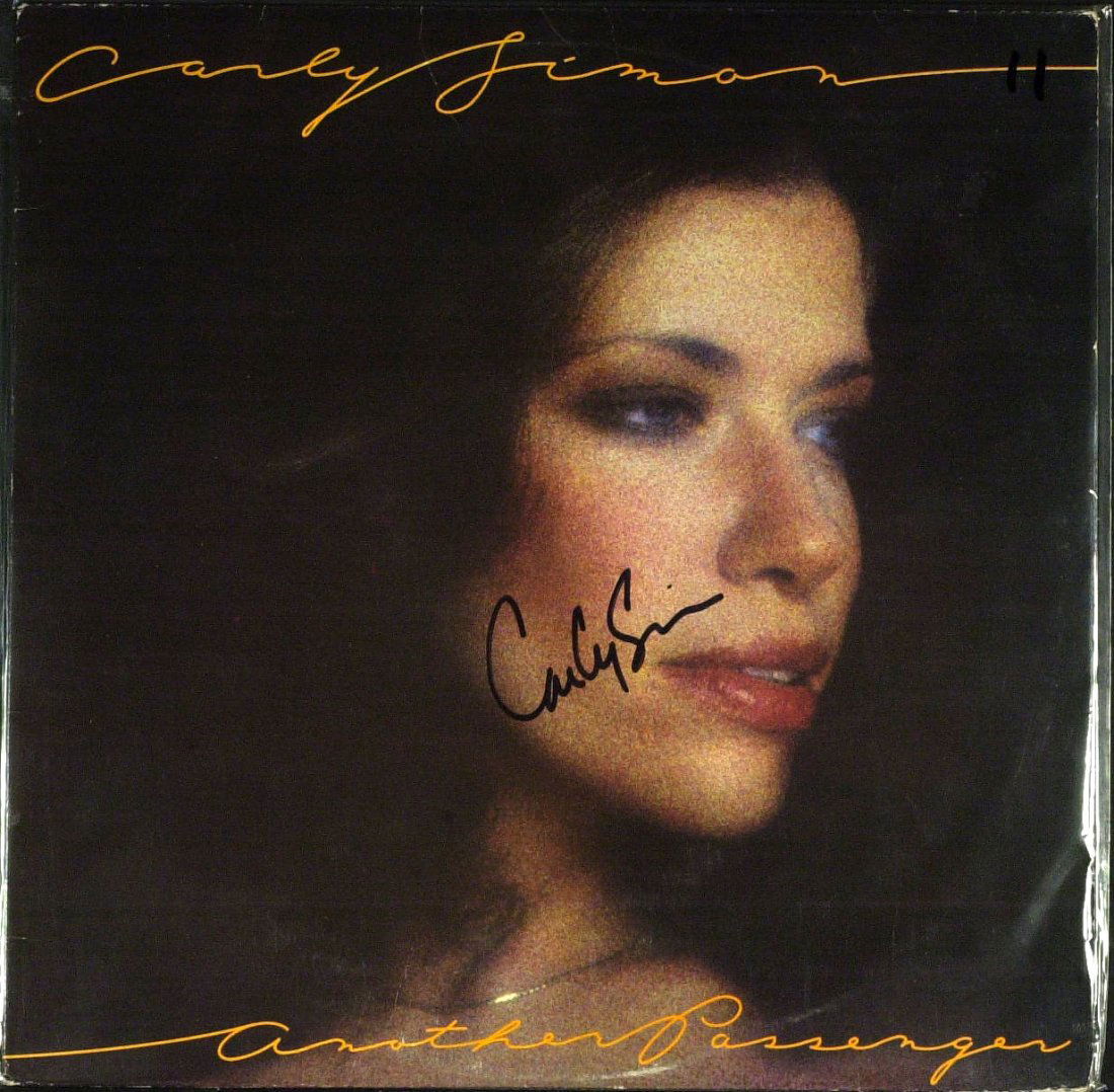 Singer, Songwriter CARLY SIMON - Her Album Signed: Carly Simon (1945- ) Singer, songwriter, musician. Simon rose to fame in the 1970s with a string of hit records; including “You're So Vain”, “Nobody Does It Better”, and “Coming Around Again
