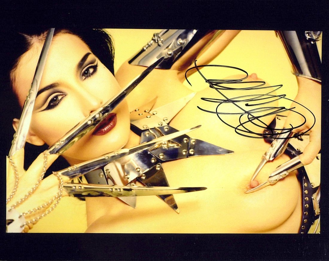 Model DITA VON TEESE - Topless Photo Signed: Dita Von Teese (Heather Renée Sweet) (1972- ) Model, dancer, actress. Von Teese is best known for her burlesque routines and is frequently dubbed “the Queen of Burlesque.” As an actress, she has 