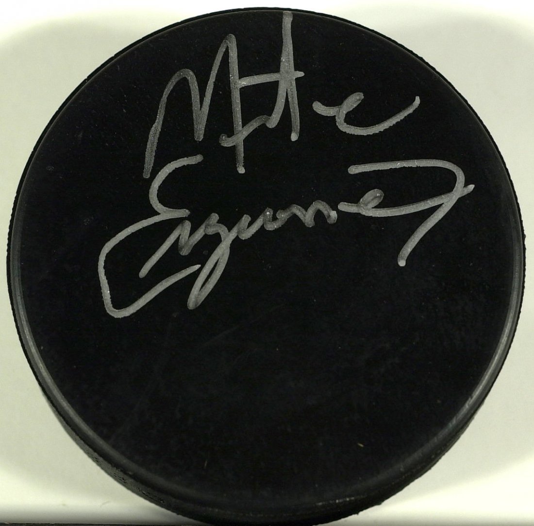 Miracle on Ice Capt MIKE ERUZIONE - Puck Signed: Mike Eruzione (1954- ) Olympic Hockey. Eruzione was the captain of the 1980 Winter Olympics United States national team that defeated the Soviet Union in the famous "Miracle on Ice" game. Puck signed 