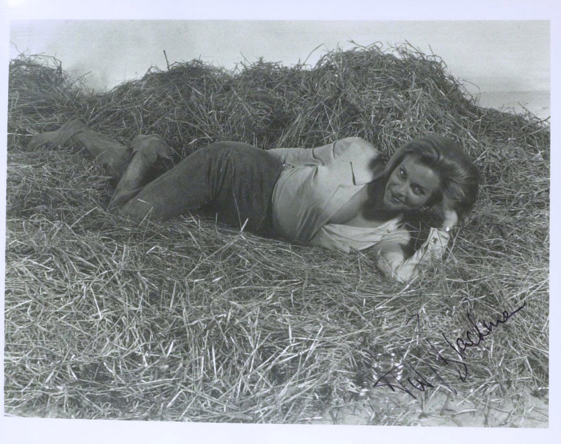 Pussy Galore Actress HONOR BLACKMAN - Photo Signed: James Bond: Honor Blackman (1925- ) British actress. Blackman is known for the roles of Cathy Gale in the television series, The Avengers and Bond girl Pussy Galore in Goldfinger. 10” x 8” black a