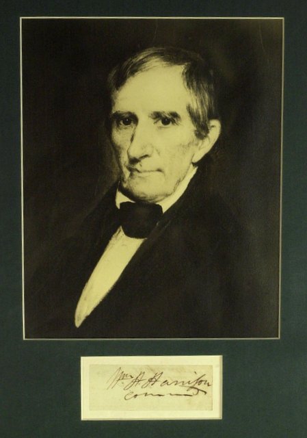 WILLIAM HENRY HARRISON - Matted Signature: William Henry Harrison (1773-1841) 9th President. 3 Â½â€ x 1 Â½â€ cut signature, â€œWm. H. Harrison Commd,â€ mounted and matted with a color printed photograph to 11â€ x 14â€.