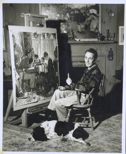 Painter NORMAN ROCKWELL - Photo Signed: Norman Rockwell. 8†x 10†black and white photograph of Rockwell at his easel signed, “sincerely Norman Rockwell.†There is a small tear in the lower margin.