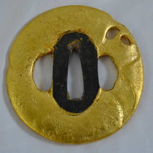 Tsuba: Iron TSUBA with gold leaves 18 k DIMENSIONS:6,8 cm X 6,5 cm