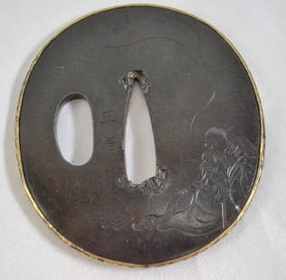 TSUBA: Mei: Masanobu Dimensions: 6.5 cm x 6 cm Description: This is a very nicely made Masanobu tsuba done in kiribori. One side is a sage and the reverse is a wave with butterfly