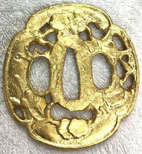 Tsuba: Iron TSUBA with gold leaves 18 k DIMENSIONS: 7,1 cm X 6,8 cm 