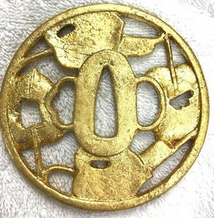 Tsuba: Iron TSUBA with gold leaves 18 k DIMENSIONS: 8 cm X 8,1 cm 