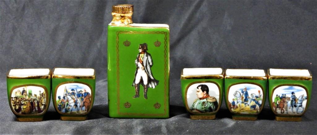 Green Cognac Flask with five cups: Cognac Flask with five cups: The L. Bernardaud Co. Produced Limoges Porcelain â€œBook-Shaped” Cognac Flasks In 1969 Containing Camus Grande Marquis Cognac To Commemorate The Bi-Centennial Of