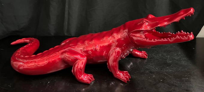 RED CROCODILE signed RICHARD ORLINSKI ( Born1966) Born Wild: RICHARD ORLINSKI (1966) Born Wild RED Crocodile Resin; signed and numbered E A N II / IV on a metal plate DIMENSIONS :Height: 12 inch / 30 cm Length: 31.50 inch / 80 cm