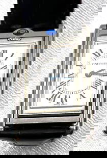 Cartier Tank Stainless Steel Men's Reversible Basculante Quartz Watch: Cartier TANK Stainless Steel Men's Reversible Basculante Quartz Watch Stainless Steel Reversible Rectangular Case Watch can be flipped over (see photos for demonstration)