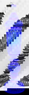Bohemian cobalt blue cut crystal Urn with Cover Extra Large 56'': Bohemian cobalt blue cut crystal Urn with Cover Extra Large 56'' This lot is in three parts, the base of urn, the urn, and the cover. The base and the urn are supposed to be together but, on t