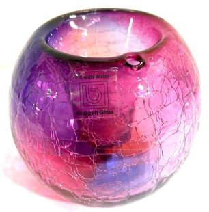 BIODGETT GLASS This beautiful tealight candle holder features that sparkles in the moonlight.: BIODGETT GLASS This tealight candle holder features a crackle finish that sparkles in the moonlight. Fill with water via a small hole in the top edge of the glass to create the illusion DIMENSIONS