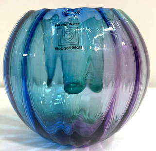 BIODGETT GLASS This beautiful tealight candle holder features that sparkles in the moonlight.: BIODGETT GLASS This beautiful tealight candle holder features that sparkles in the moonlight. Fill with water via a small hole in the top edge of the glass to create the illusion. DIMENSIONS