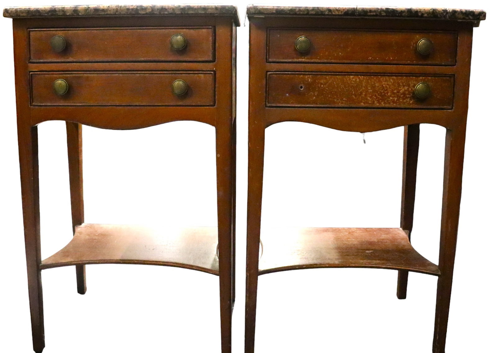 A pair of side tables with marble tops: A pair of side tables with marble tops There are two drawers, and a shelf beneath the drawers. The marble is broken in three places on one of the tables. DIMENSIONS for each one: H
