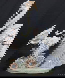 LARGE LLADRO 'BABY'S OUTING' PORCELAIN FIGURINE:  LARGE LLADRO 'BABY'S OUTING' PORCELAIN FIGURINELladro porcelain figure depicting a mother with baby in a carriage, #4938. Marked to undersideDIMENSIONS: Height: 13.25 inch /