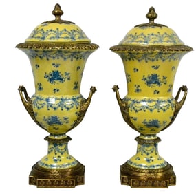 Pair of French Porcelain Urns.