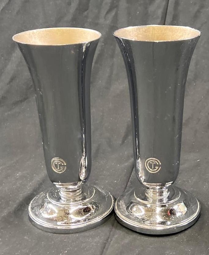 A pair of Georges Halais chrome plated vases from France: A pair of Georges Halais chrome plated vases produced for the Compagnie Generale Transatlantique, used on board S.S. Normandie, designed circa 1934, This iconic vase design was created for t