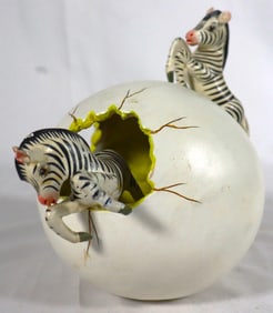 Mexican "Hatchling" egg sculpture with two colorful Zebra