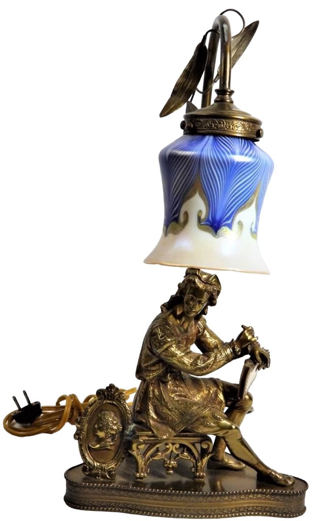 Bronze and metal lamp Art Nouveau: Bronze and metal lamp Art Nouveau DIMENSIONS: Height 18-inch Width 9-inch Depth 4.75 inch Shipping: Basel Auction House will refer local third-party USA and international shippers. Purchasers pick up 