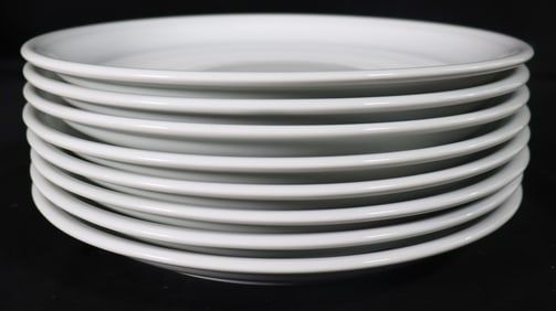 Eight White Thomas dinner plates from Germany