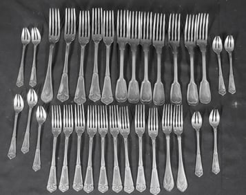 32 unmatching Sterling Silver Forks