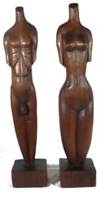 PAIR CARVED WOODEN TORSO OF A FEMALE and MALE FORM