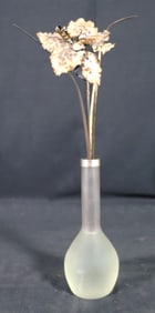 Silver and frosted glass vase with one flower.