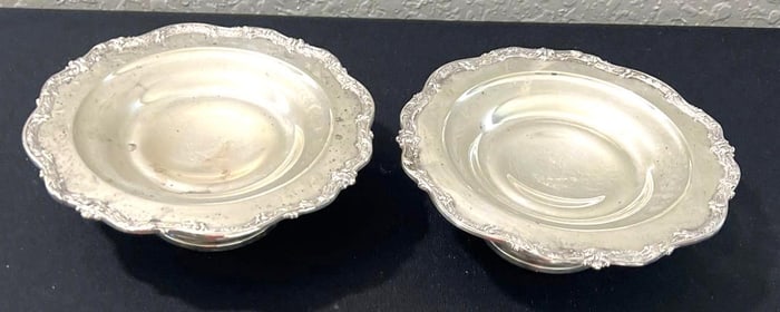 Two round sterling silver dishes with monogram