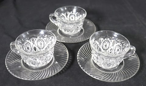 Three Vintage Glass Cups and Saucers