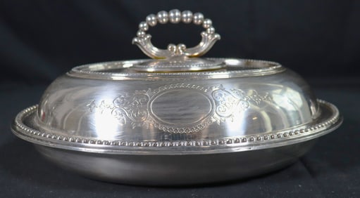 A silver-plated vegetable tureen and cover.