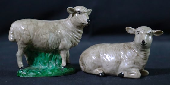 Two Vintage porcelain lambs one lying down and another standing part of nativity set dated and