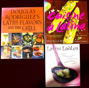 Three cookbooks with recipes two by Douglas Rodriguez and one by Michelle BERNSTEIN