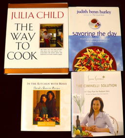 Four cookbooks with recipes